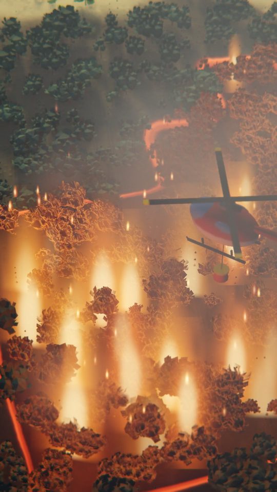 A helicopter drops its water on the fire